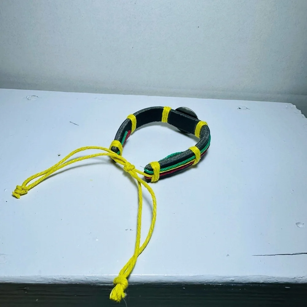 Handcrafted Rasta Bracelet with Leaf Emblem
